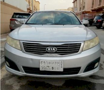كيا اوبتيما 2009 فضي نظيفه جدا 